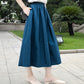 Big plaques white skirt 2021 new literary retro wind A word long section solid color umbrella skirt with pocket