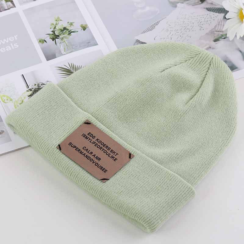 Knitted cap autumn and winter women's hat Korean version of the alphabet stickers wool hat outdoor warm melon hood street cold cap