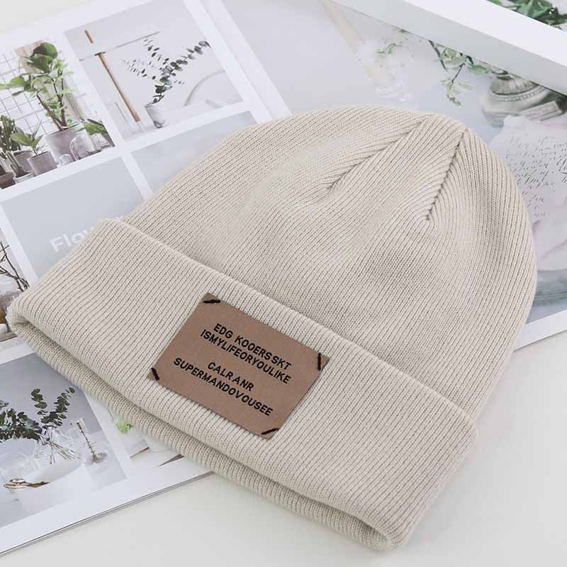 Knitted cap autumn and winter women's hat Korean version of the alphabet stickers wool hat outdoor warm melon hood street cold cap